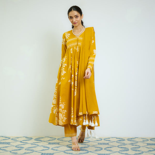 Zehra Yellow Cotton Kurta Set with Mul Cotton Dupatta & Tassel Detail